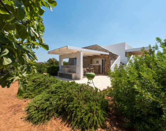 Vakantiehuis met een terras en barbecue Fani Luxury Villas in Italië.