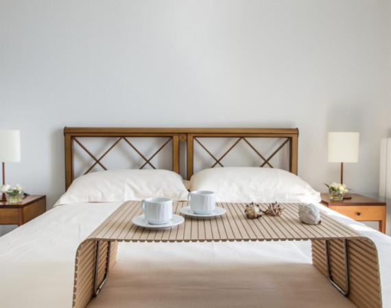 Kamer met een tweepersoonsbed Fani Luxury Villas in Italië.
