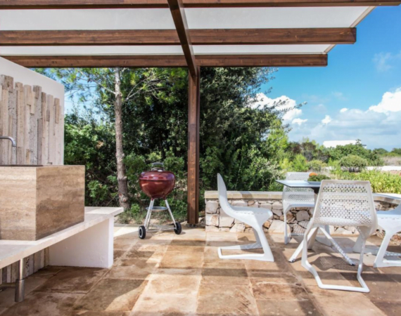 Terras met een barbecue Fani Luxury Villas in Italië.