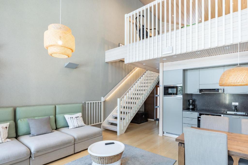 Nova Skyland Hotel Nordic in Finland Lapland cottage woonkamer.