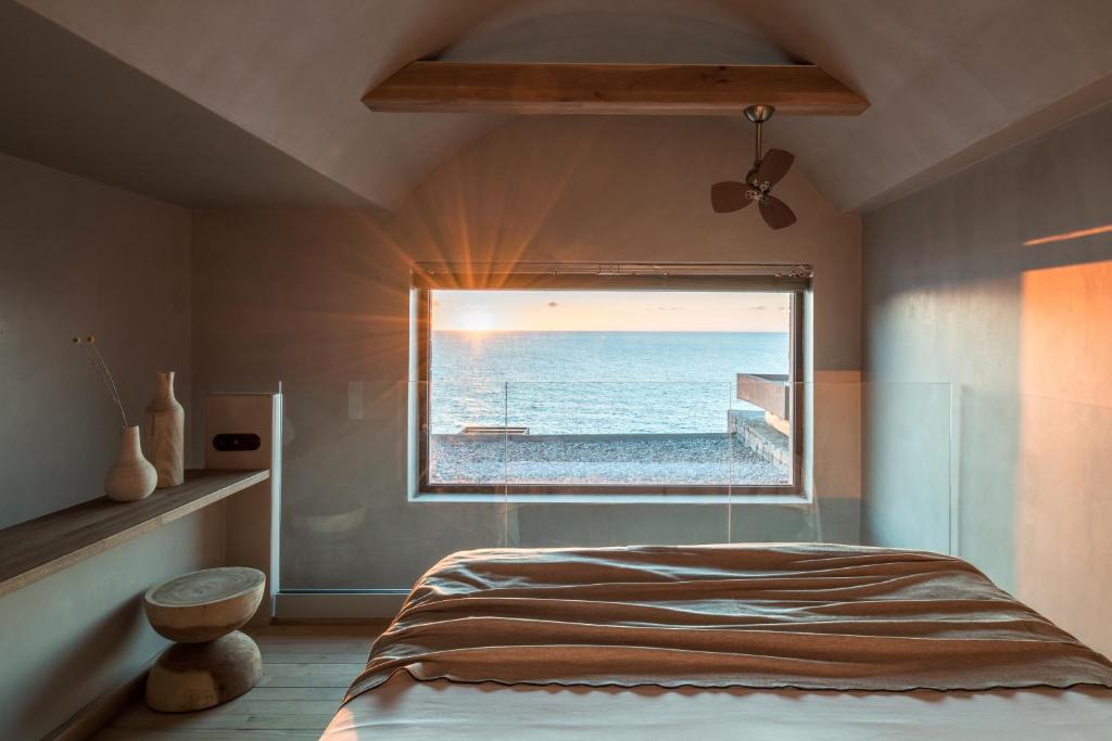Acro Suites in Griekenland Suite met uitzicht over de zee.
