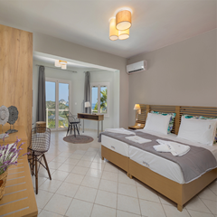 Kerri Villas Slaapkamer 1 tweepersoonsbed Kerri Villas in Griekenland slaapkamer met een tweepersoonsbed.